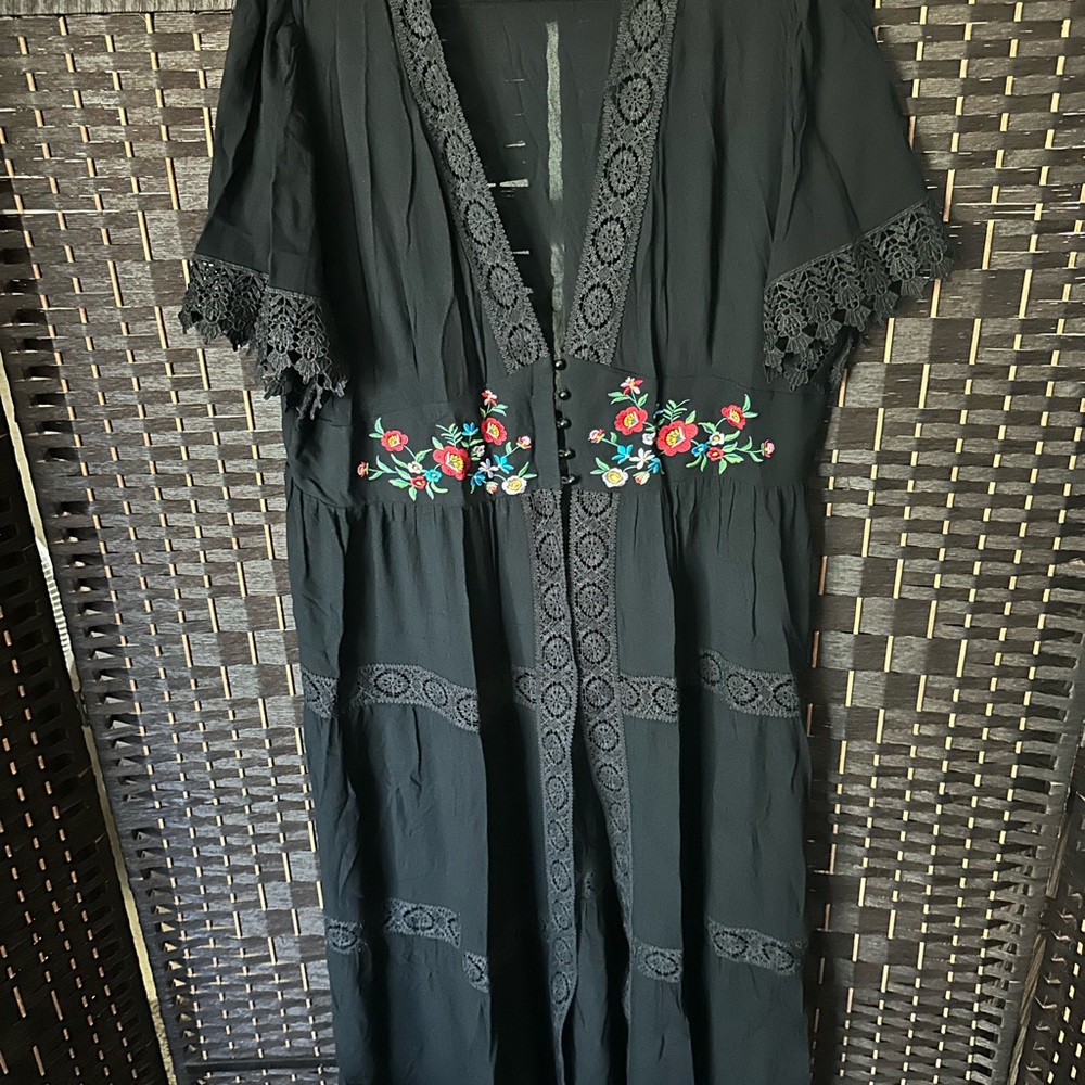 Jet black cardigan with flower detail